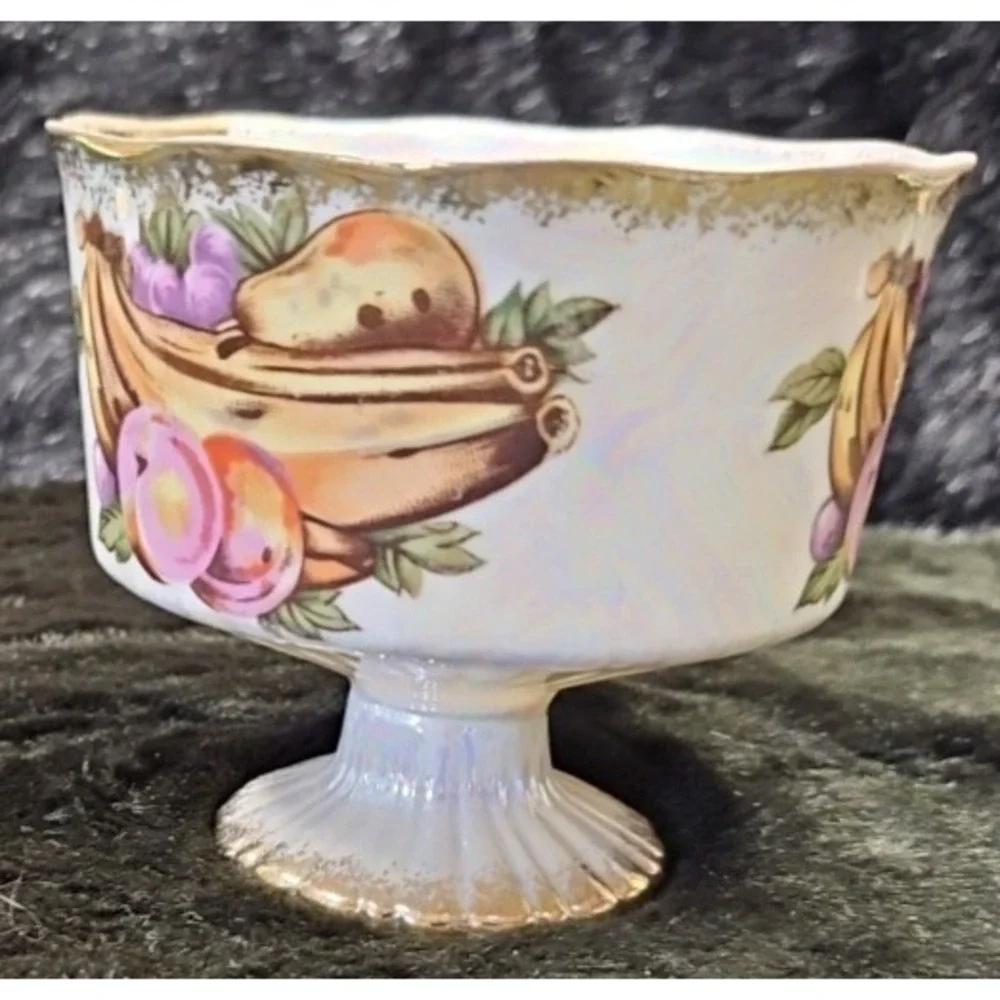 Lusterware Handpainted Fruit with gold finishings,‎ footed cup and saucer set